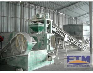 Charcoal briquette machine